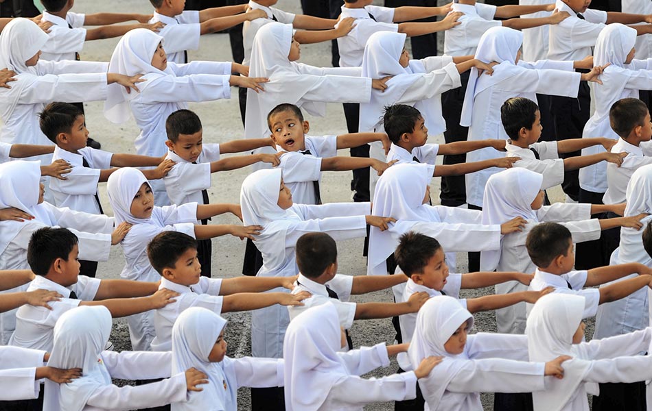 Astro Awani / Bernama Primary school students on their first day of school.